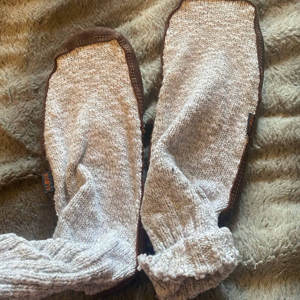 Soled sock slippers